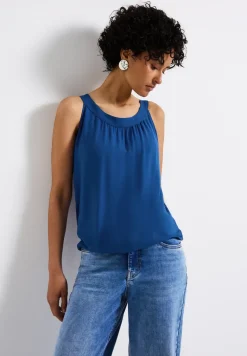 Top à structure mixte