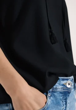 Top chemisier avec split neck et rubans