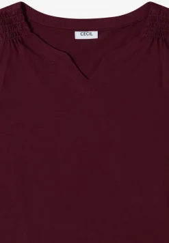 Top en couleur unie à encolure fendue