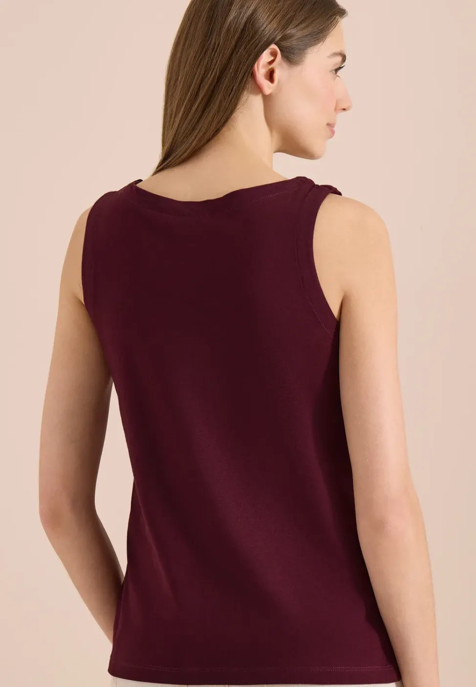 Top en couleur unie à encolure fendue