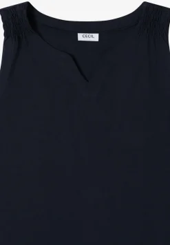 Top en couleur unie à encolure fendue