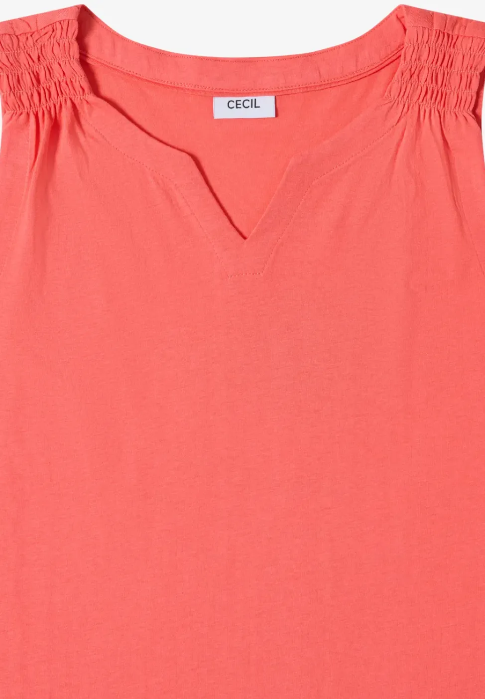 Top en couleur unie à encolure fendue