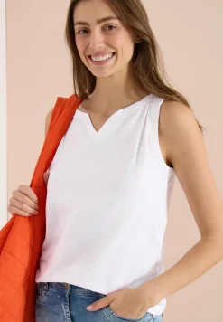 Top en couleur unie à encolure fendue