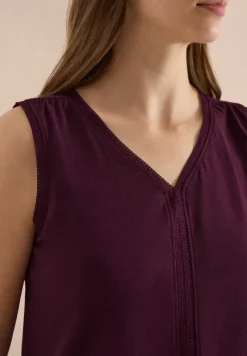 Top avec col en V et bande crocheté