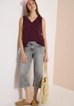 Top avec col en V et bande crocheté