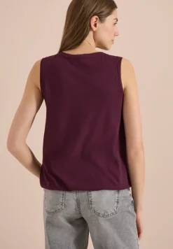 Top avec col en V et bande crocheté