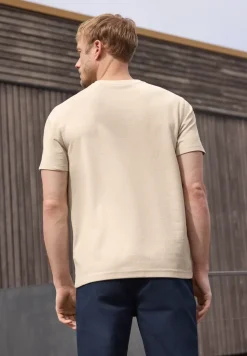 T-shirt à col rond et structure tricotée