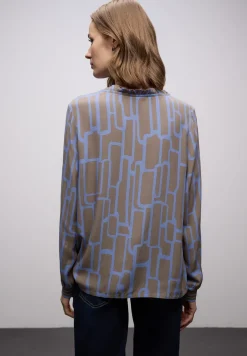 Tunique à motifs avec tape