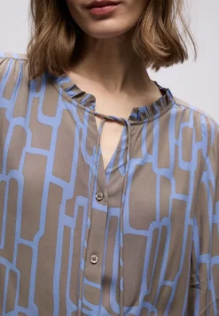 Tunique à motifs avec tape