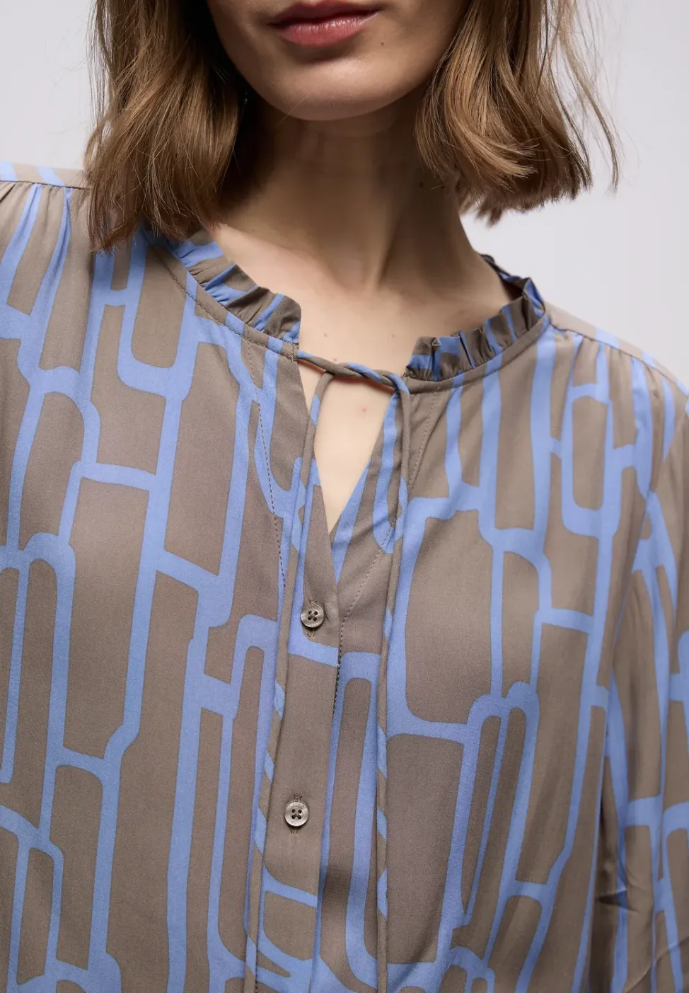 Tunique à motifs avec tape