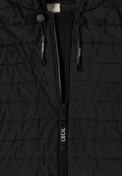 Veste avec un mélange de structures et une capuche