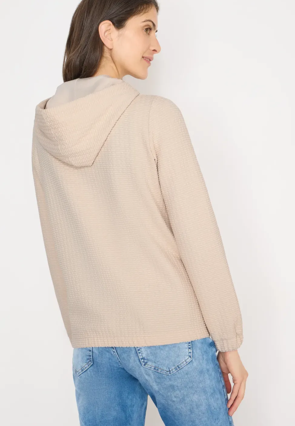Veste à capuche avec structure