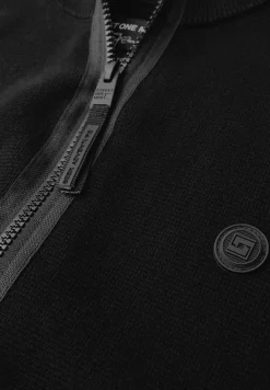 Veste en tricot avec col montant